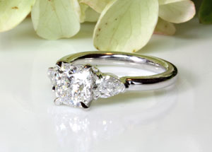 Cushion Cut Diamond with Pear Shape Side Diamonds