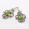 Peridot & Rose Cut Diamonds in Black Gold