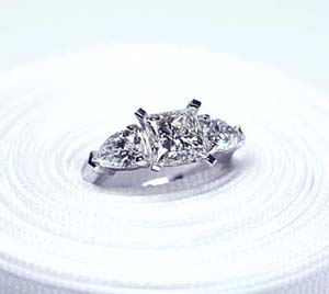 Princess Cut Center Diamond with Pear Shape side Diamonds